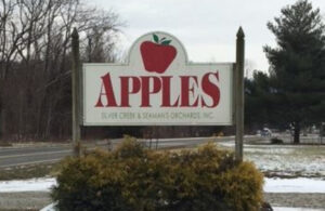 Apples sign next to highway
